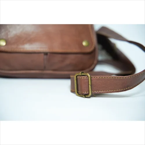 Handcrafted Leather Sling Bag - Compact and Stylish
