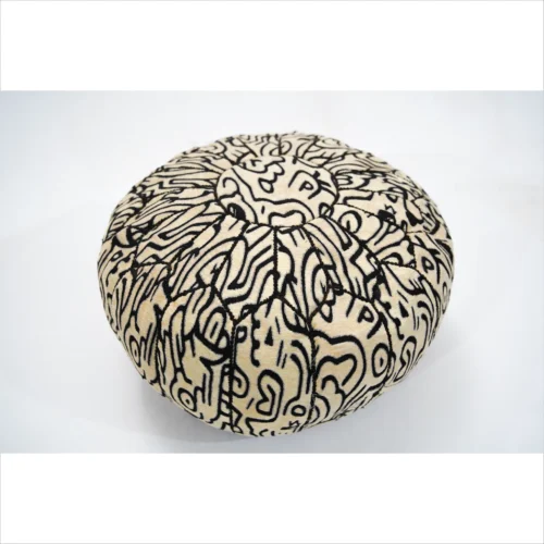 Handcrafted Black and Beige Pouf with Intricate Patterns