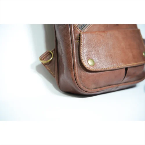 Handcrafted Leather Sling Bag - Compact and Stylish
