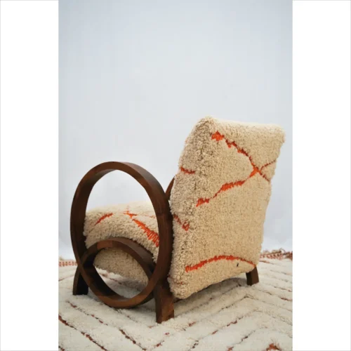 Handcrafted Wool Berber Chair with Orange Accents
